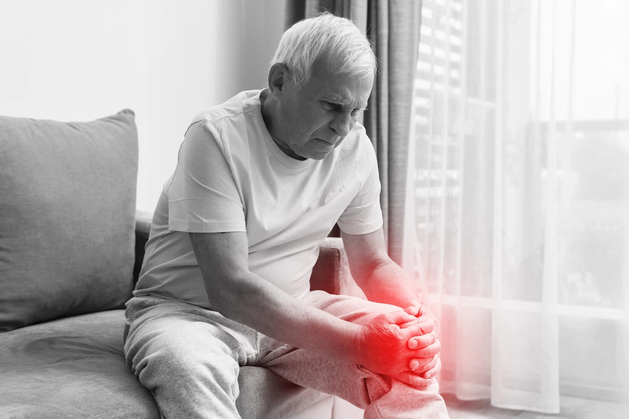 elderly person with knee pain