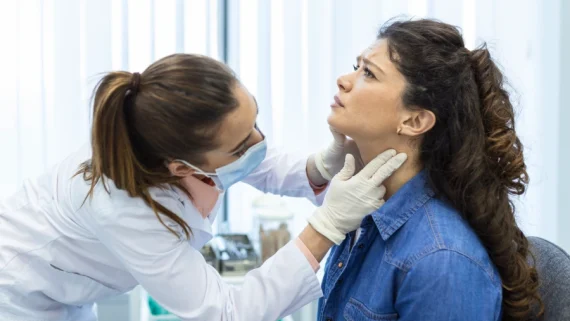 Doctor examining a patient