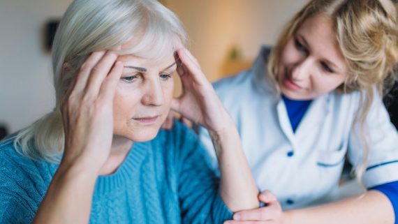 person who has lost memory and nurse helping